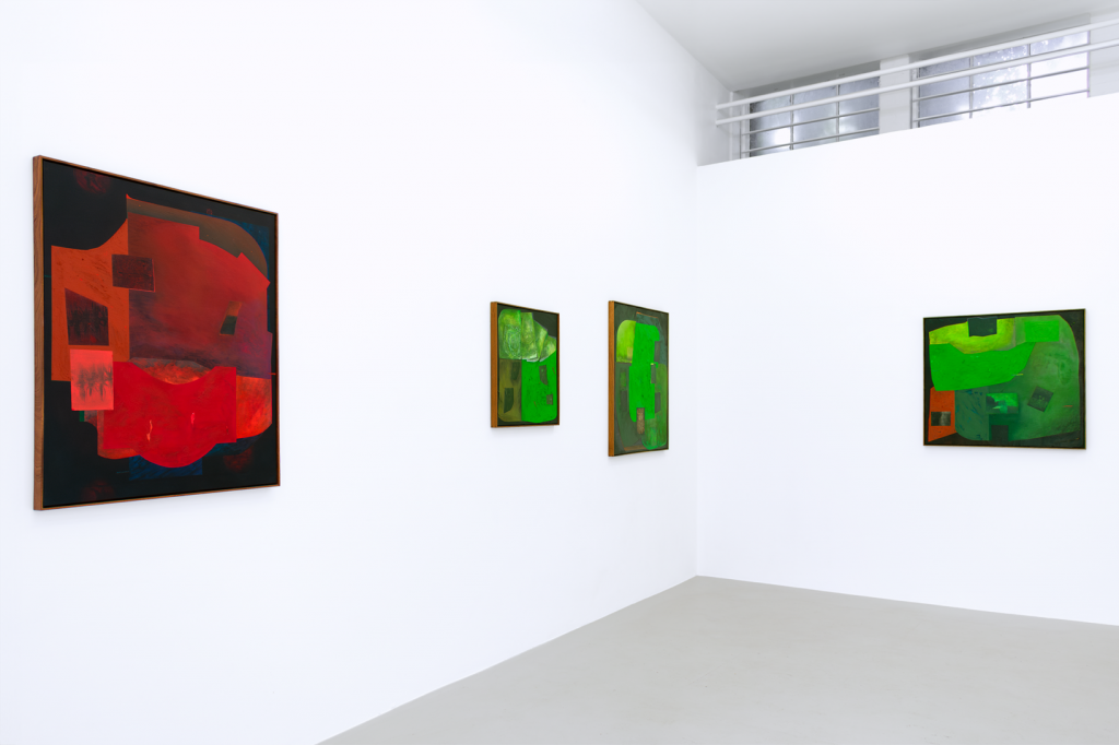 install shot from the turning worm showing four paintings