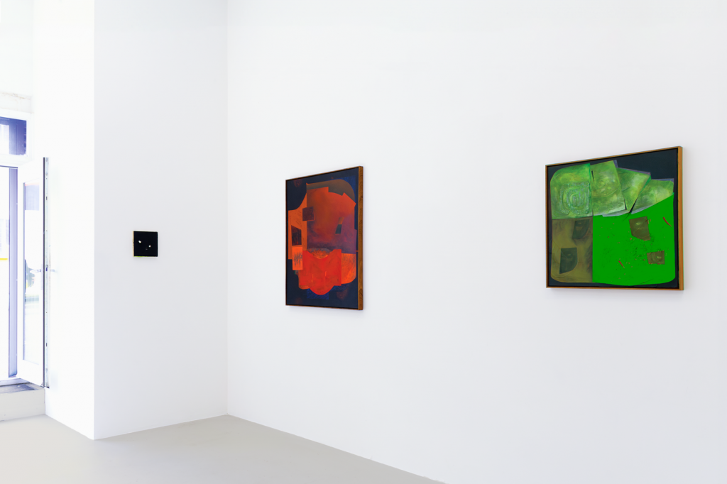 install shot from the turning worm showing three paintings